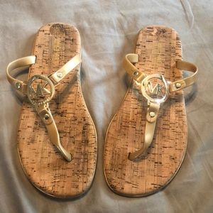 Michael Kors MK charm jelly flip flops in gold